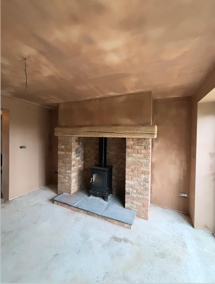 Fireplace with drying plaster
